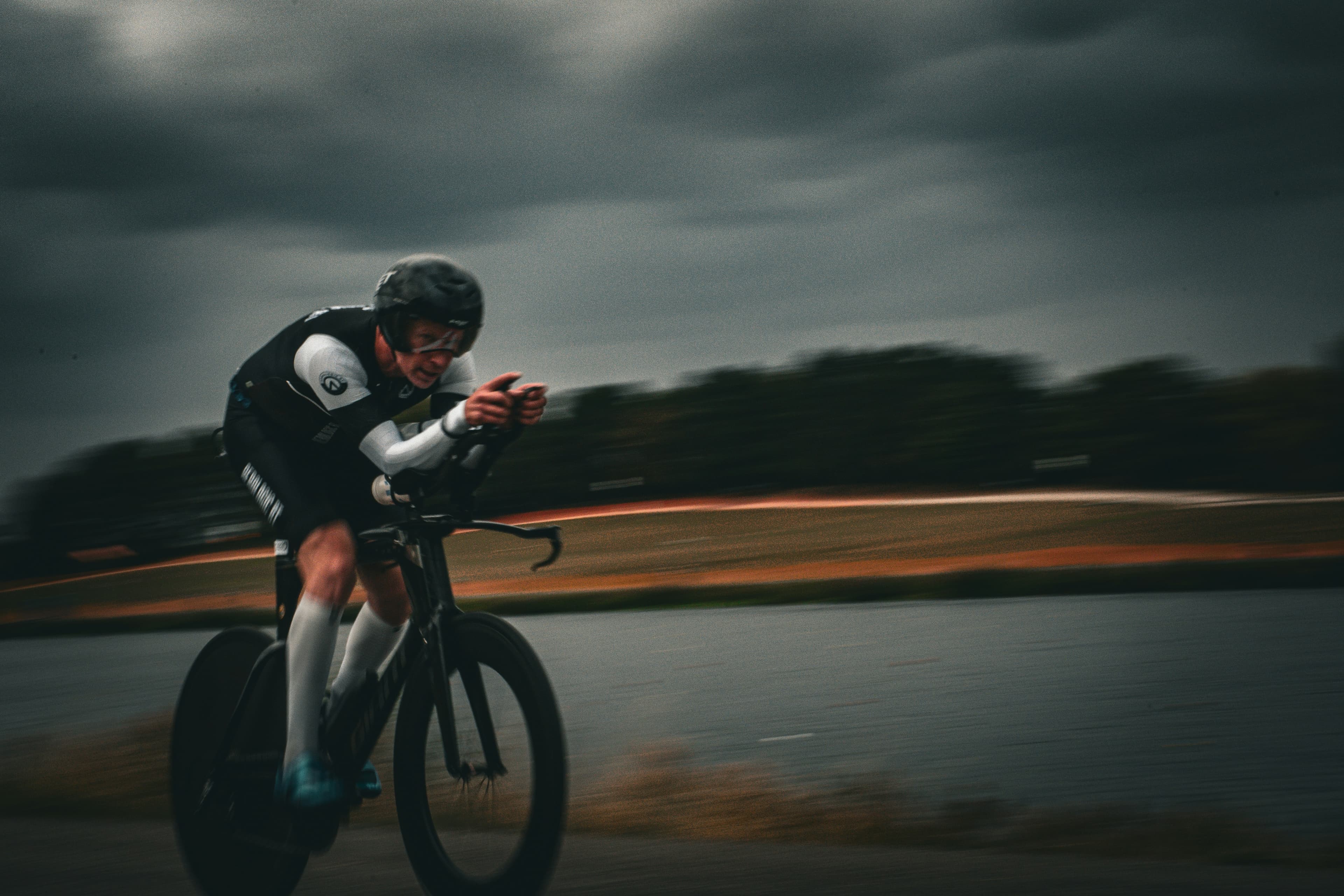 Cyclist training on the road with blurred motion background